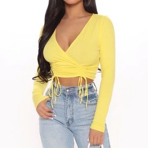 Bright yellow asymmetrical tie long sleeve crop